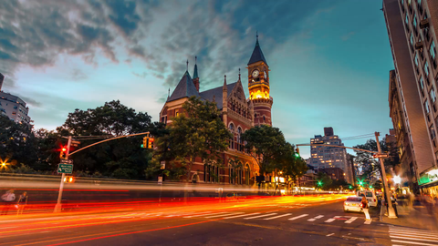 The Jefferson Market Library clock tower in evening, sunset to night with beautiful colors in Greenwich Village - 4K timelapse in NYC