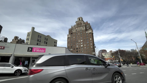 Jefferson Market Library clock tower turning corner onto 8th Street in Greenwich Village Manhattan New York City NYC