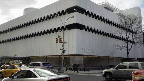 cars driving on 7th ave outside Lennox Health Pavilion - Hospital in Greenwich Village in Manhattan NYC
