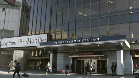 driving by Penn Station on 8th Ave on fall day in Manhattan NYC