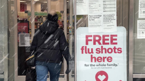 free flu shot sign at pharmacy CVS drug store in New York City NYC