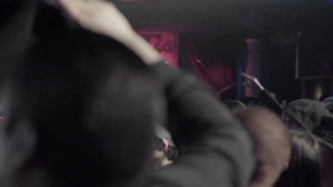 crowd of fans in audience - standing in concert - slow motion watching hip hop music show
