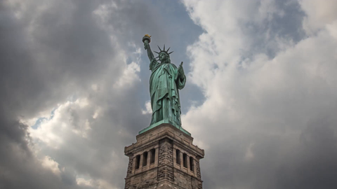 Statue of Liberty on base - 4K HDR upward angle full body shot timelapse in New York City