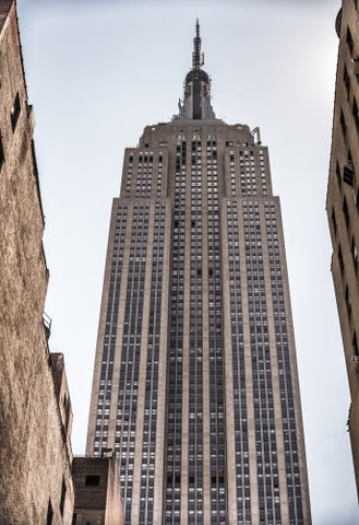 Empire State Building upward angle - towering skyscraper in Manhattan