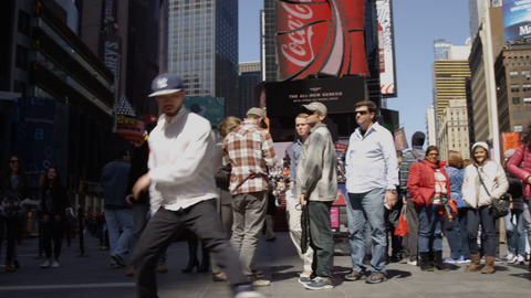 beboy doing windmills in Times Square - breakdancing in slow motion in 4K NYC