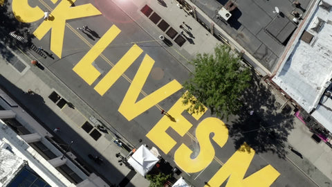 Black Lives Matter on Fulton Street in Bed Stuy Brooklyn aerial view New York City NYC