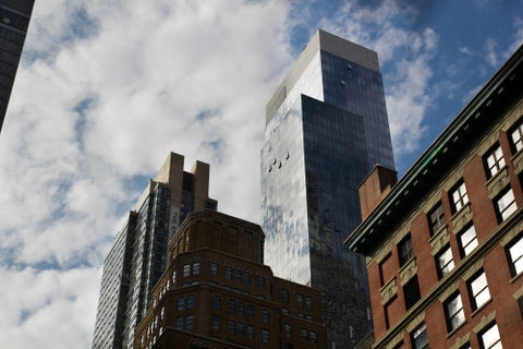 skyscraper towering over buildings in Manhattan