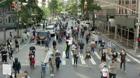 Black Lives Matter march up 5th Avenue with signs in Manhattan New York City NYC