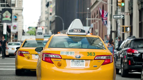 rear of taxicab on bright sunny day in NYC