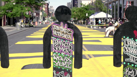 silhouette cut-outs of Black people victimized by police brutality - installation in Bed Stuy Brooklyn New York City