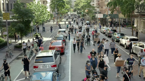 Black Lives Matter activists marching on 5th Avenue with Breonna Taylor sign in Manhattan New York City NYC