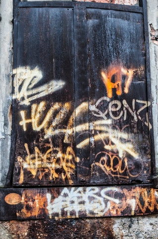gritty graffiti and vandalism on gritty doorway