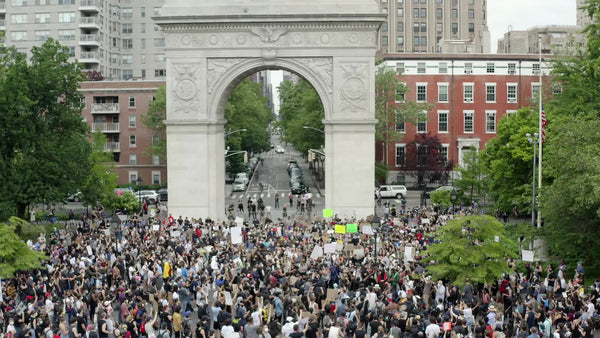 Washington Square Park arch with crowded Black Lives Matter rally peop ...