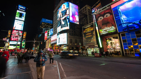 Elmo and ads in Times Square at night with bright lights and billboards - 4K timelapse at night in New York City