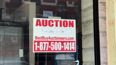 auction sign on empty commercial space in Manhattan New York City NYC