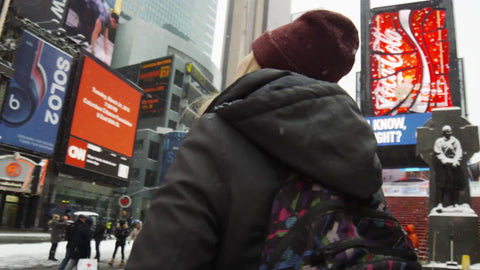 beautiful foreign girls looking around Times Square laughing - blonde twins in snow in slow motion NYC