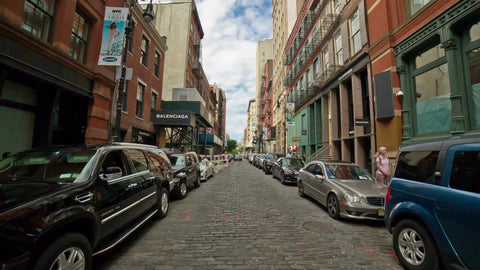 cobblestone street in SoHo on beautiful summer day