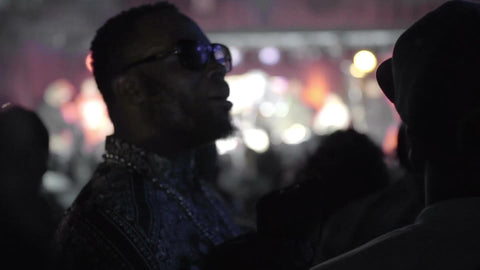 man with sunglasses in crowd at hip hop show - live music concert