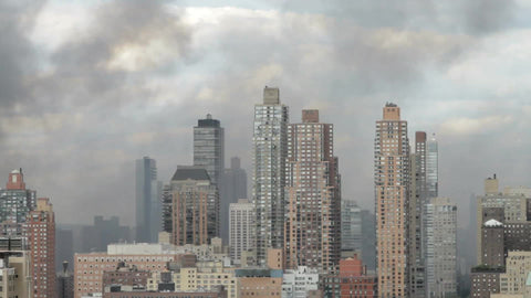 smoke cloud from fire covering buildings in Midtown Manhattan
