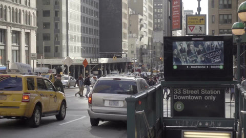 33rd Street downtown subway station entrance, people crossing street in slow motion in 1080 HD in NYC