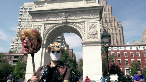 Trump bloody head on a stick costume in Washington Square Park