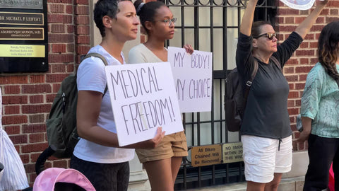 anti-vax activists with medical freedom and my body my choice signs in New York City NYC