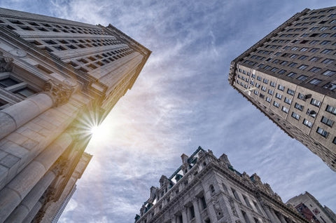tall buildings in Financial District - FiDi in HDR in Downtown Manhattan on sunny day
