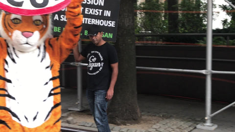 tiger costume at animal abuse protest - protesting circus at vegan march in New York City