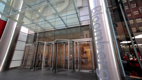 man exiting Bloomberg Building in Midtown Manhattan New York City