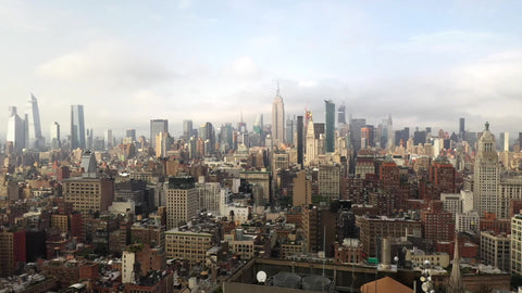 NYC aerial moving side across Cooper Square and Union Square Manhattan Buildings in New York City