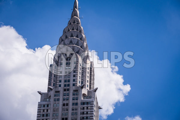 Chrysler Building famous Art Deco style skyscraper close-up with blue sky on summer day in Manhattan NYC