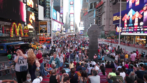 Times Square crowded with people on summer day