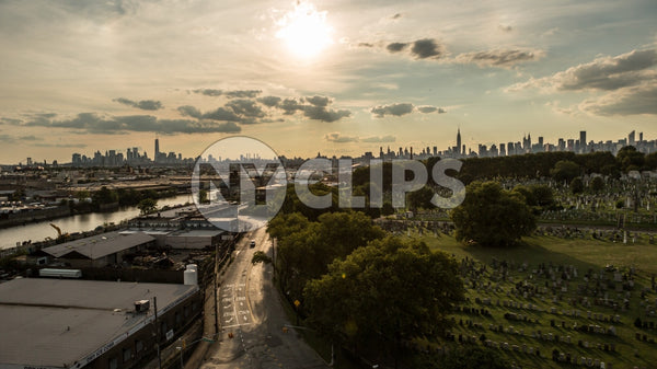 Manhattan skyline with Calvary Cemetery in Queens at sunset in early evening late afternoon in NYC