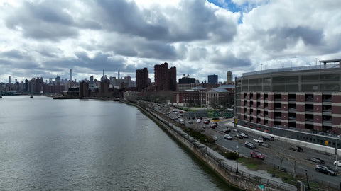cars driving on FDR drive in East Harlem New York City slow