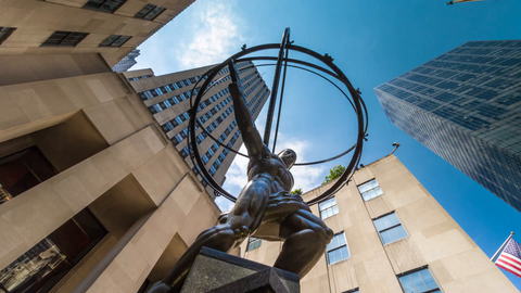 Atlas statue upward angle outside Rockefeller Center in Manhattan, timelapse in 4K and 1080 HD NYC
