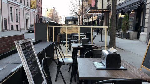 outdoor dining seating empty on 8th Street Manhattan in cold winter New York City NYC