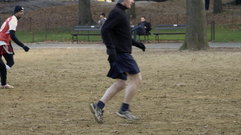 people playing soccer in fall Central Park autumn New York City