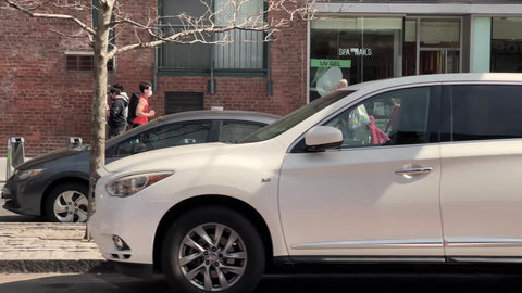 Peter Cooper Village Stuyvesant Town people on 1st avenue in Manhattan red brick buildings above in New York City NYC