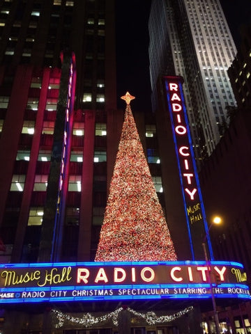 Christmas tree on Radio City Music Hall at night