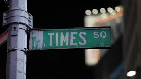 Times Square sign at night in New York City