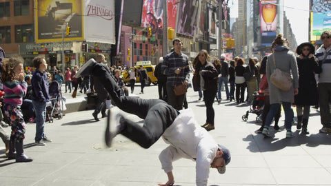 breakdance windmills in Times Square with crowd watching - breakdancing in Manhattan in 1080 HD and 4K NYC
