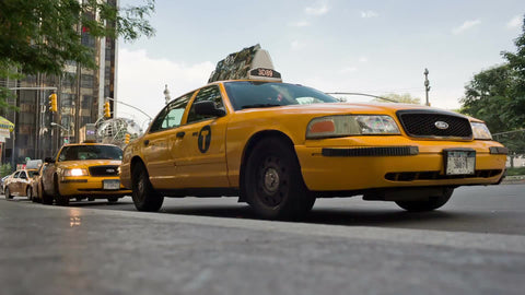 taxistand at Columbus Circle - taxicabs lined up on street in Manhattan NYC