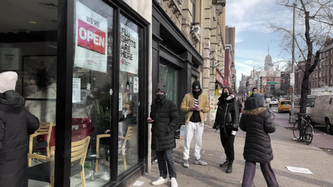 people on line waiting outside CityMD facility during COVID pandemic in Greenwich Village New York City NYC