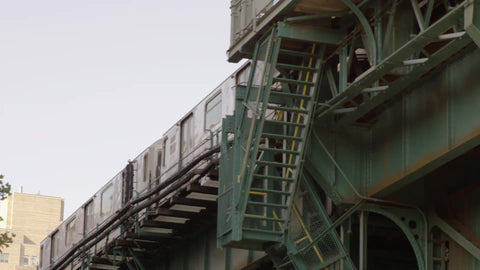 subway riding on elevated track in Harlem New York City NYC