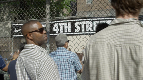 tracking shot of basketball court at West 4th Street the Village - black people and white - diversity of fans in slow motion 4K in Manhattan NYC